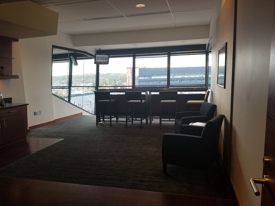 Private suite overlooking a stadium field